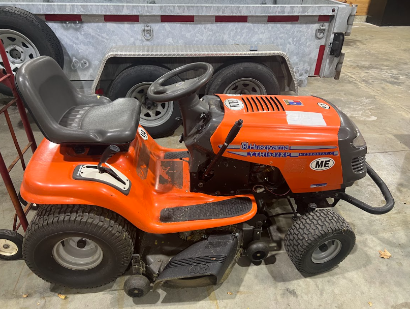 USED Orange Husqvarna YTH1542XP riding lawn tractor, 42 inch. Hydrostatic transmission.