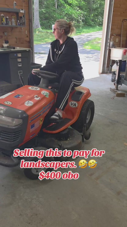 USED Orange Husqvarna YTH1542XP riding lawn tractor, 42 inch. Hydrostatic transmission.